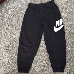 Nike Black Joggers with White Swoosh Logo